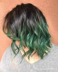 Black Hair Pops Of Green Hairdo